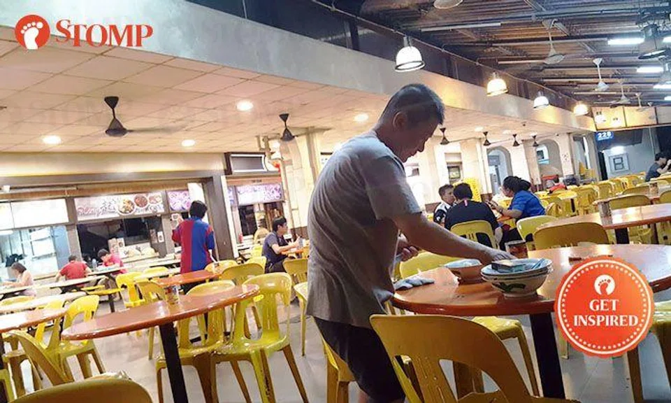 Being a supervisor of a coffee shop in Yishun does not stop this guy from cleaning tables