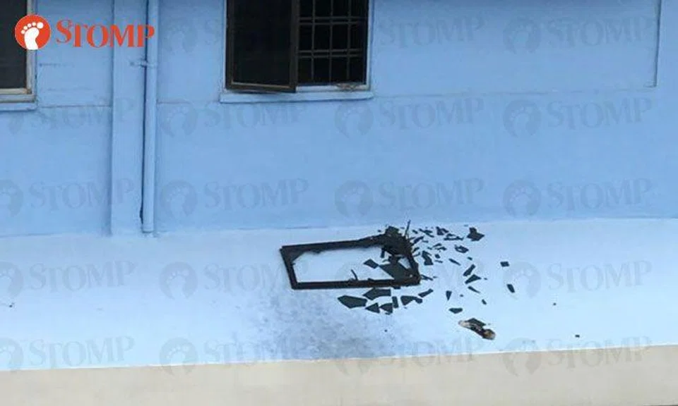 Police called in after window falls on ledge at Hougang HDB block, shattering glass