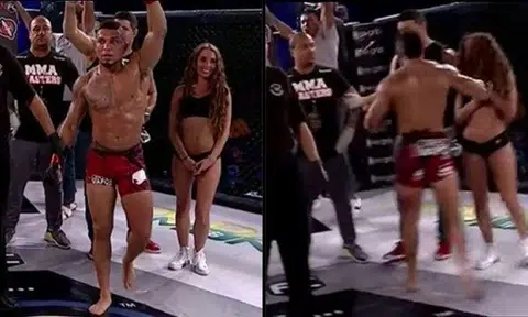 Ouch! MMA fighter punches ring girl in the jaw after losing fight