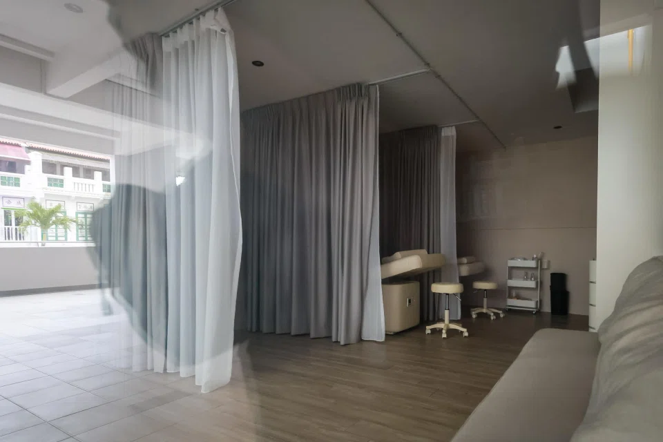 A vacant unit in Tanjong Pagar Plaza that has yet to be cleared out. ST PHOTO: GAVIN FOO