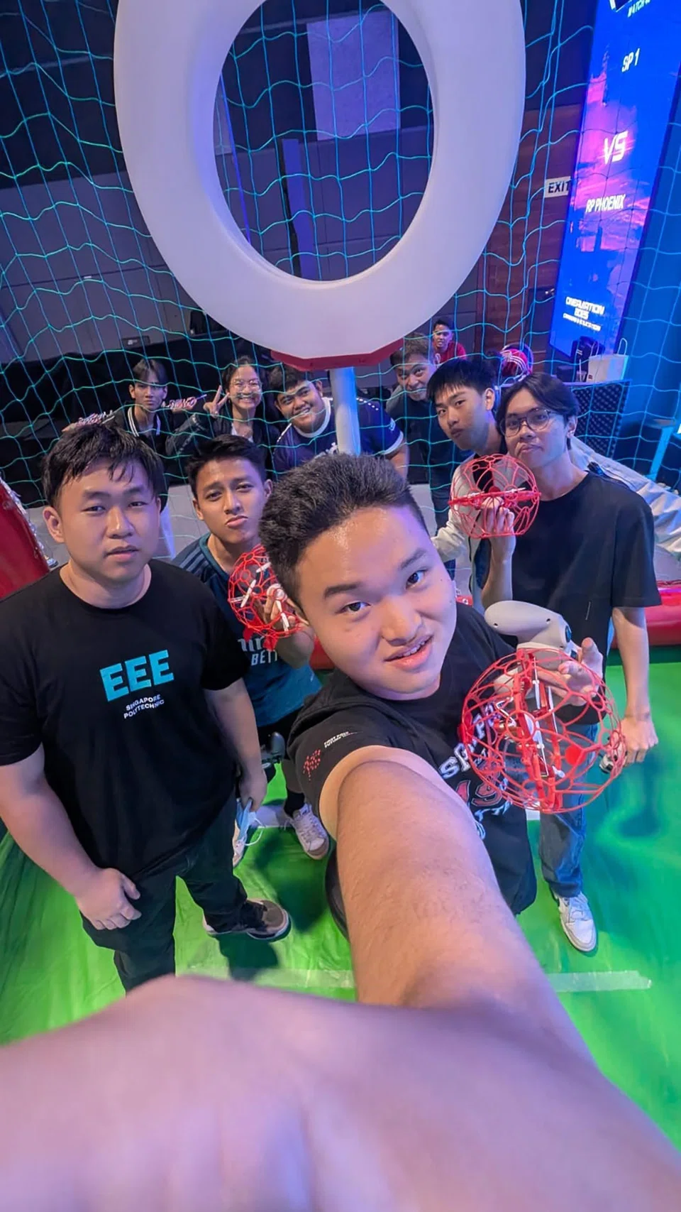 SP Team 1 posing around the arena after a match.