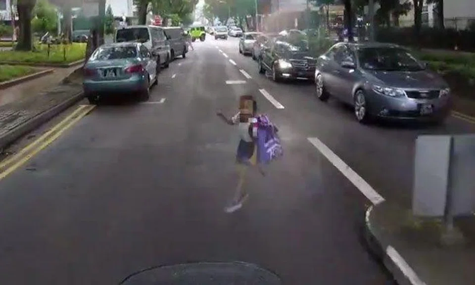 Young girl narrowly avoids disaster after running in front of oncoming motorcycle