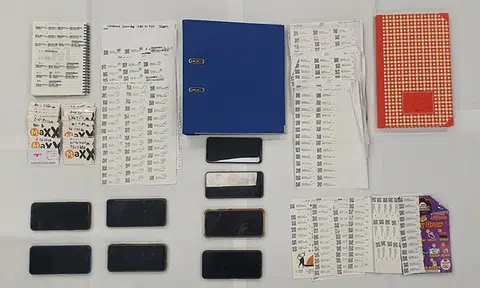 10 people investigated for suspected fraud after police raid 3 phone shops