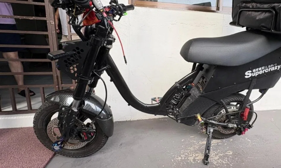 A mobility device in an HDB common corridor