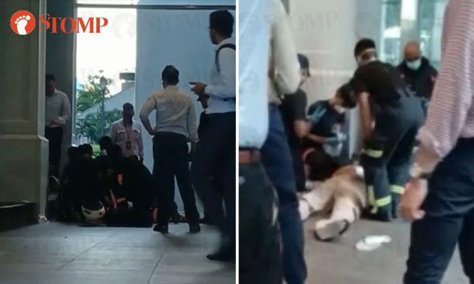 Man taken to hospital after collapsing near Raffles Place MRT Station
