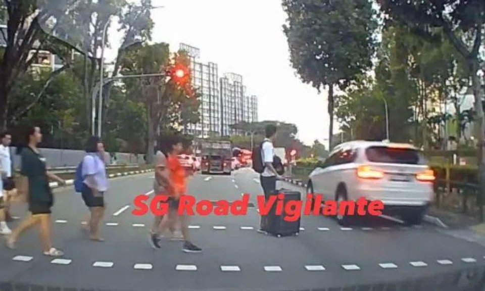 Dash cam video of the incident was posted online by SG Road Vigilante.