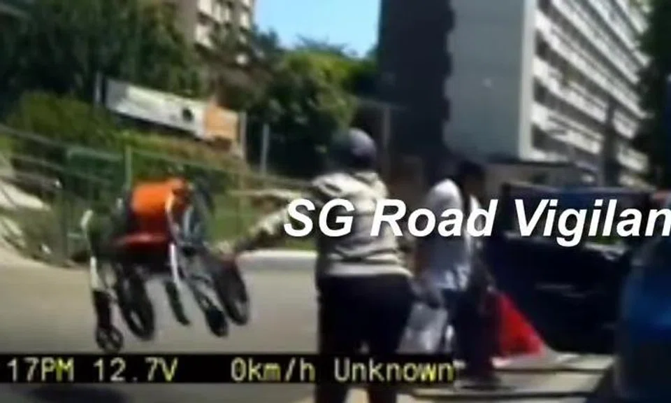 ComfortDelGro to take disciplinary action against cabby who threw passengers' wheelchair -- but there's a twist