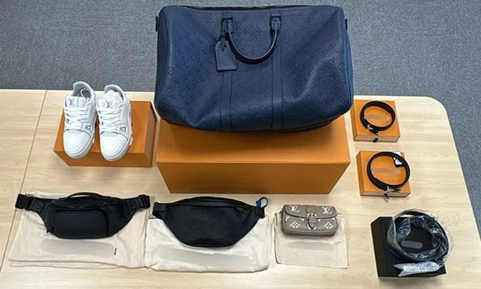 Taiwanese duo arrested for using stolen credit card details to buy luxury goods at MBS, Ngee Ann City