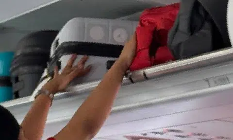 Chinese national caught stealing from overhead luggage on flight to Singapore, hides cash in jacket