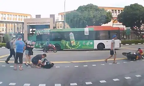 Passers-by band together to help motorcyclist flung from bike during accident