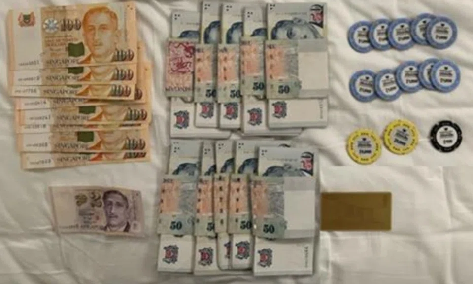 Over $140,000 worth of casino chips and cash and an array of handphones were seized.