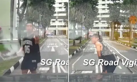 Man claims car hit him while crossing road in Geylang, flashes middle finger and allegedly fakes injury