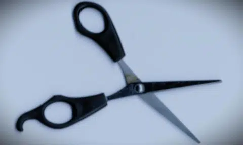 Homeless man got cut on cheek after another threw scissors at him in quarrel over donated clothes at shelter