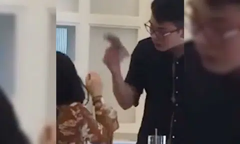 Man in Malaysian pushes and throws money at GF after she allegedly spilt water