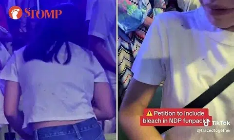 The video she posted shows little black spots on people's arms and clothing.