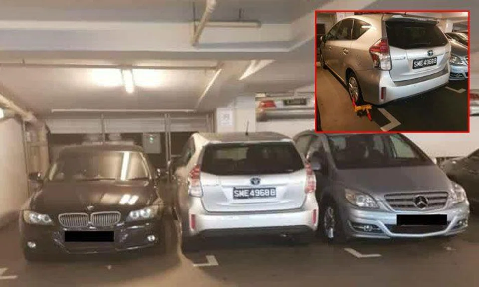 Toyota Prius gets wheel clamped after squeezing into space between Merc and BMW