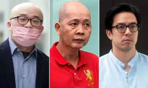 (From left) Chin Yann Cherng, Goh Thiam Chye and Darius Chia Zhilong were charged with voyeurism in court on July 12, 2023. ST PHOTOS: KELVIN CHNG
