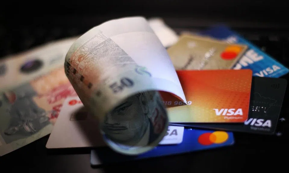 Sharing credit card details or OTP in scams is not gross negligence, but ignoring repeated warnings is, said the Small Claims Tribunal.