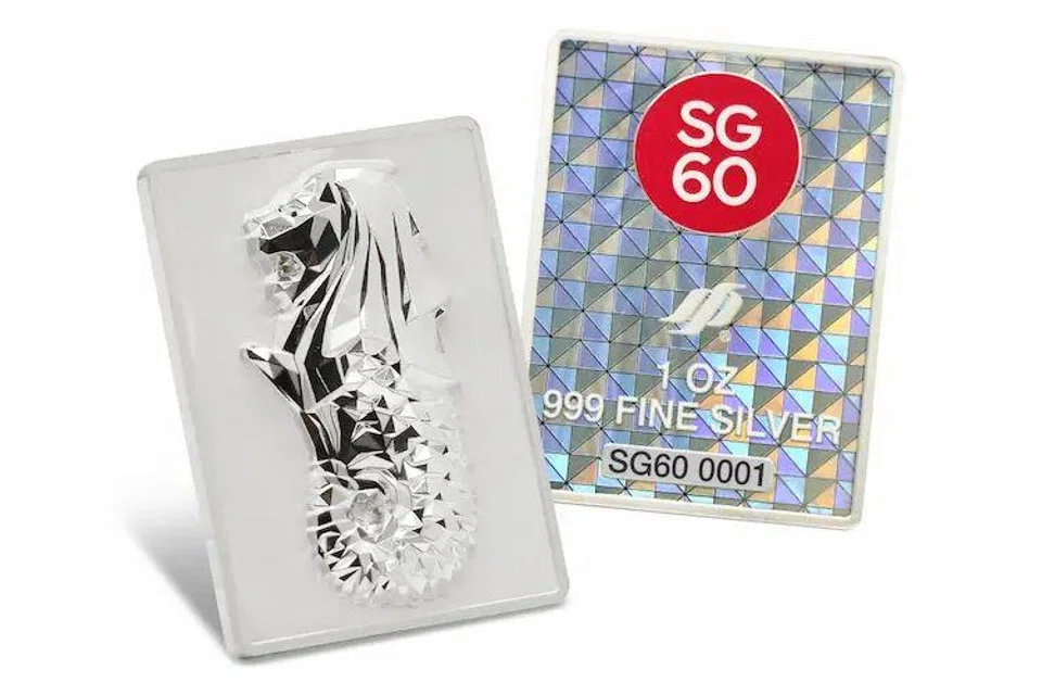 The Dazzling Merlion ingot – available from $120 – is individually serialised and bears an SG60 prefix on its back.