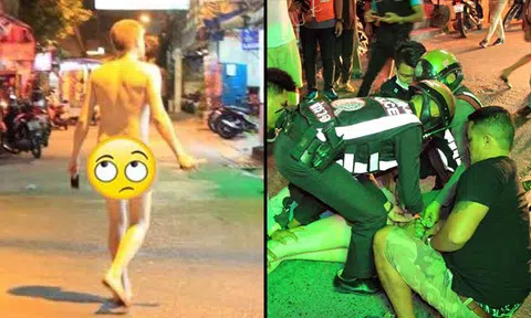 Disorientated naked man swings knife at passerbys at Thai night market