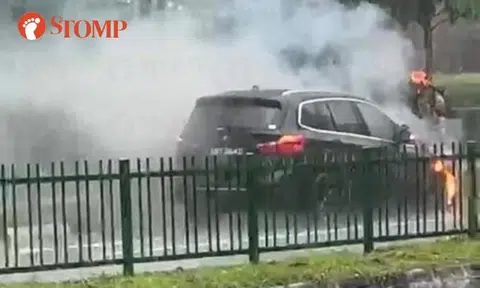 BMW catches fire in rain at Bukit Batok East Avenue 3