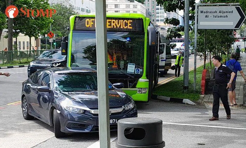 Car swerves into path of SBS Transit bus at Victoria Street, 2 passengers injured