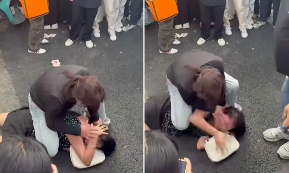 Woman pinned, slapped, China, affair allegations