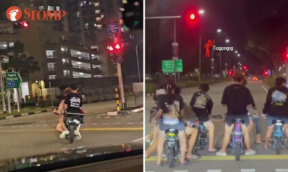 Youths seen riding PMDs on the road without helmets: 'Life is precious, kids'