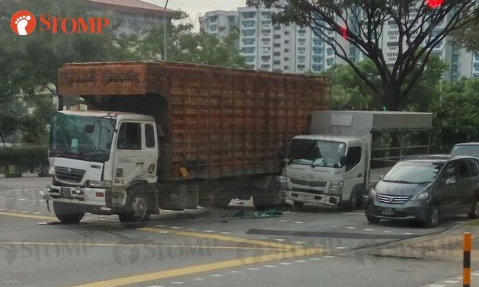 13 sent to hospital after accident involving 3 lorries at Woodlands junction