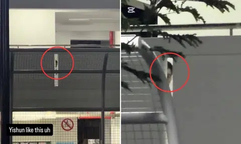 man peering through hdb wall in yishun
