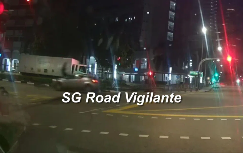 In a video uploaded on the SG Road Vigilante Facebook page, a cyclist is seen flying off his bicycle following a collision with a car.