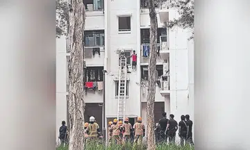 boy stranded on hdb ledge in yishun after electronic lock runs out of battery
