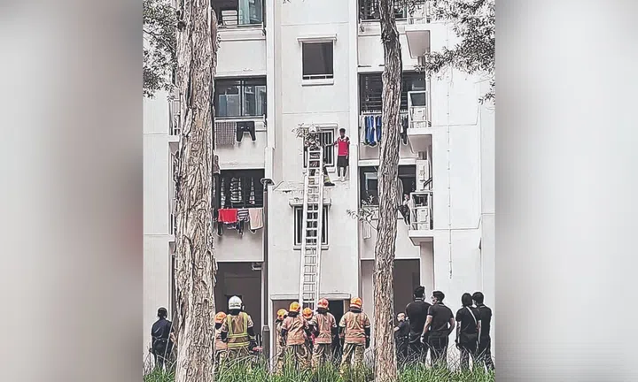 boy stranded on hdb ledge in yishun after electronic lock runs out of battery