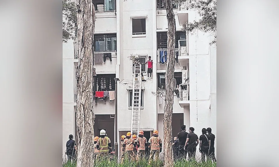 boy stranded on hdb ledge in yishun after electronic lock runs out of battery