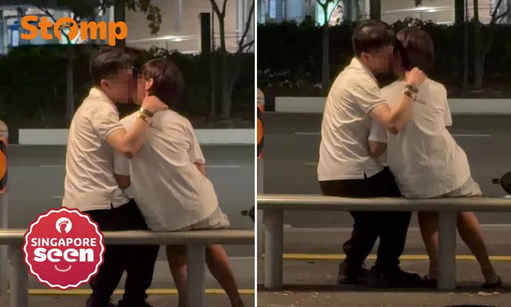 public display of affection, Bedok bus stop, couple kissing