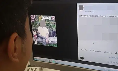Man accuses twin brother of groping GF's breasts, shames him with posters placed up at void deck