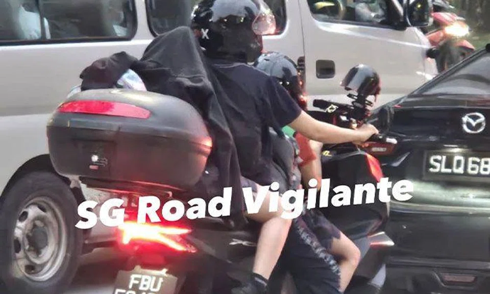 Jacket fails to hide extra pillion rider on motorcycle at Punggol