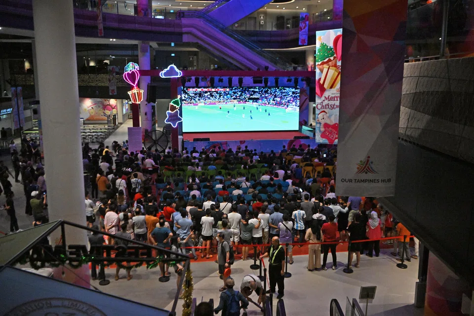Supporters watching the World Cup at Our Tampines Hub
