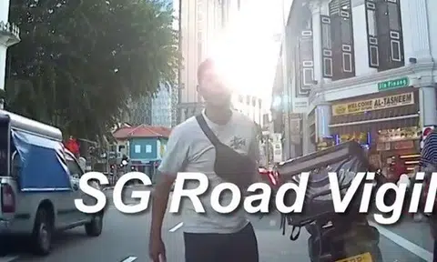 Motorcyclist spits on parked car at North Bridge Road -- but why?