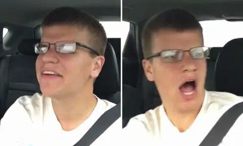 Driver sings passionately -- but screams as he goes down a hill and crashes