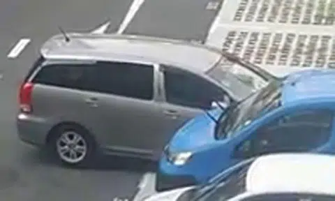 Watch this driver struggle to reverse out of parking lot after 12 tries in 3 minutes