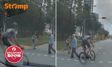 Cyclist runs red light and narrowly misses elderly pedestrians in Punggol