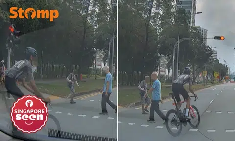 Cyclist runs red light and narrowly misses elderly pedestrians in Punggol