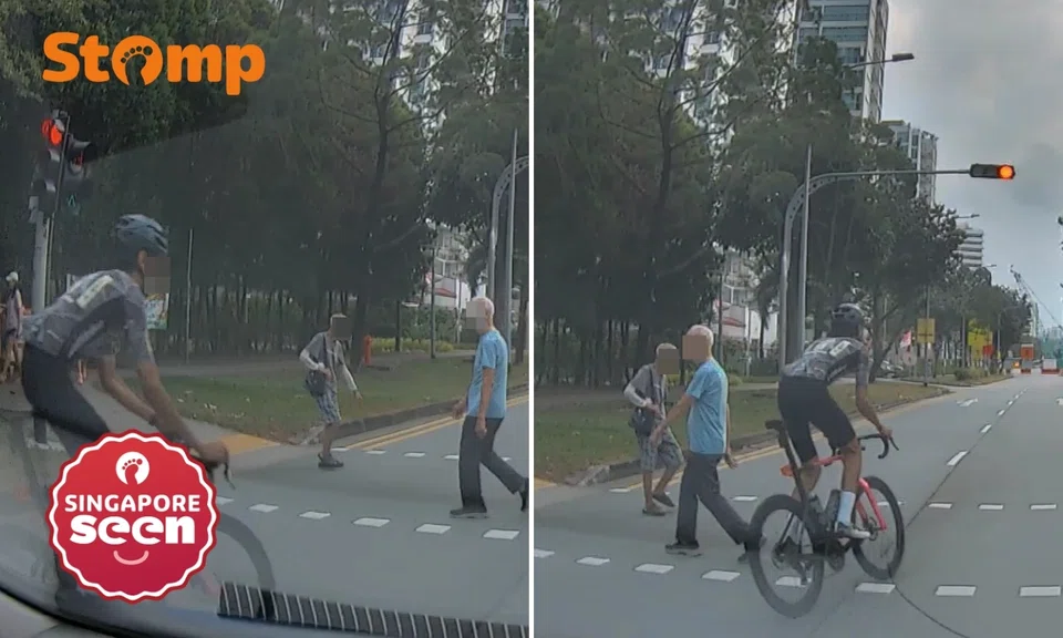 Cyclist runs red light and narrowly misses elderly pedestrians in Punggol