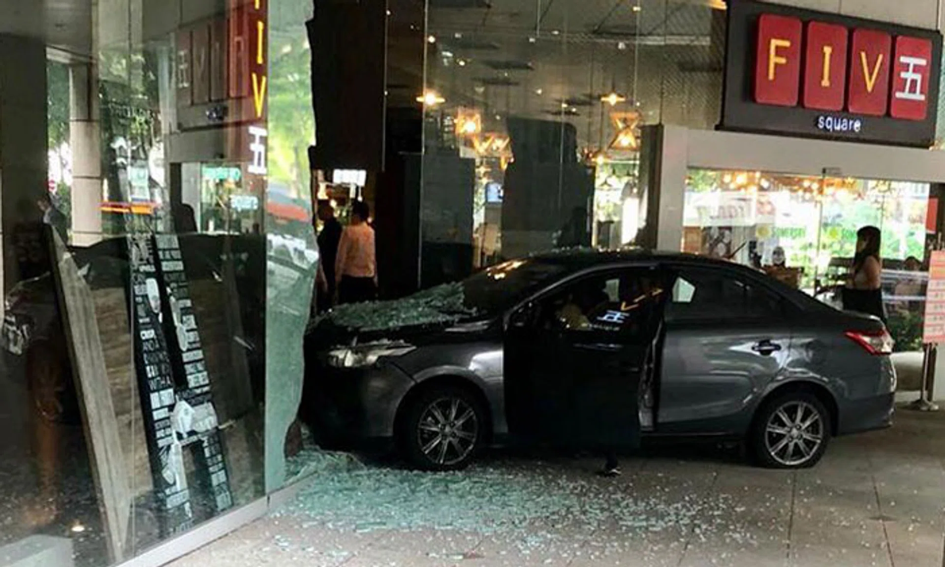 53-year-old woman taken to hospital after crashing car into bar at ...
