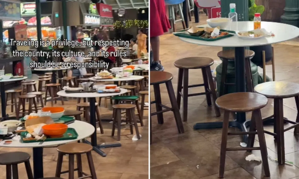 tourist dirty plates trays Lau Pa Sat tables