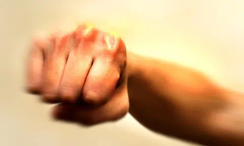 Teen punches police officer