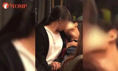 Couple kissing on bus remain oblivious to kids and commuters: "They were making fools of themselves"