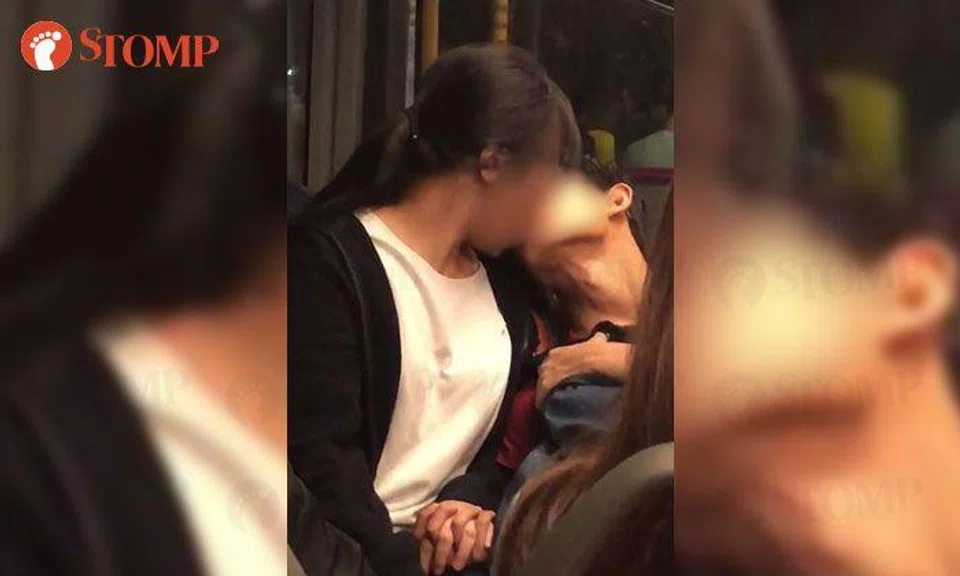 Couple kissing on bus remain oblivious to kids and commuters: "They were making fools of themselves"