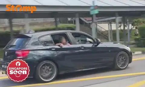 child facing out of window ang mo kio